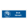 Påbud klistremerke: "Bruk hårnett" m/tekst liggende